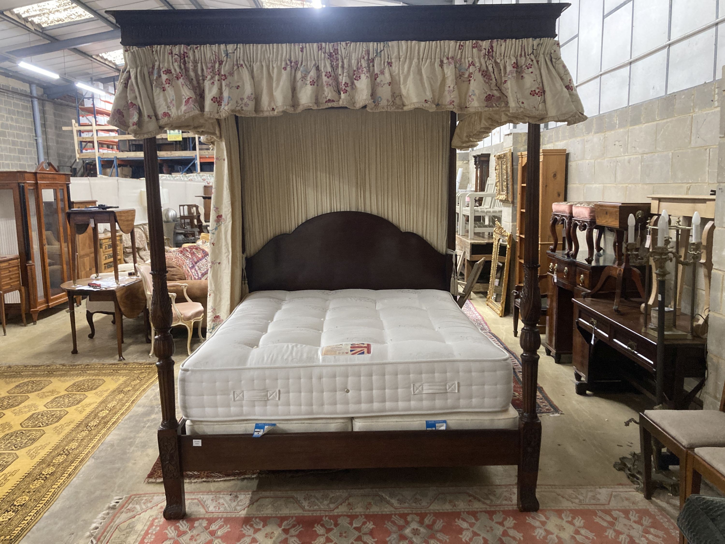 And So To Bed. A George III style mahogany four poster 5ft bedstead, together with drapes, divan and mattress, L.215cm